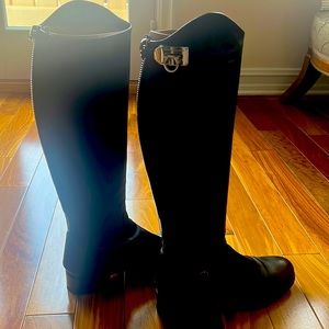 Salvatore Ferragamo knee high black leather boots.